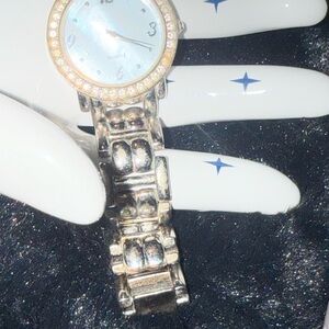Vintage Avon Silver Watch with mother of pearl face and Crystal Bezel